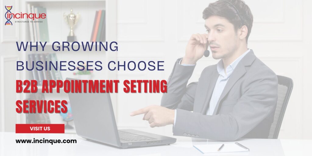 A B2B appointment setting professional talking on a headset and using a laptop to schedule client meetings.